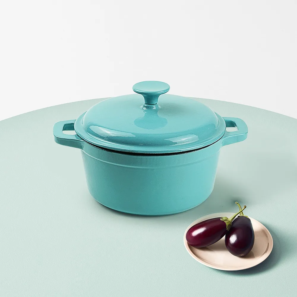 Enamel cast iron Dutch pot with lid and double handles for cooking, baking and stewing. It is healthy and sturdy.