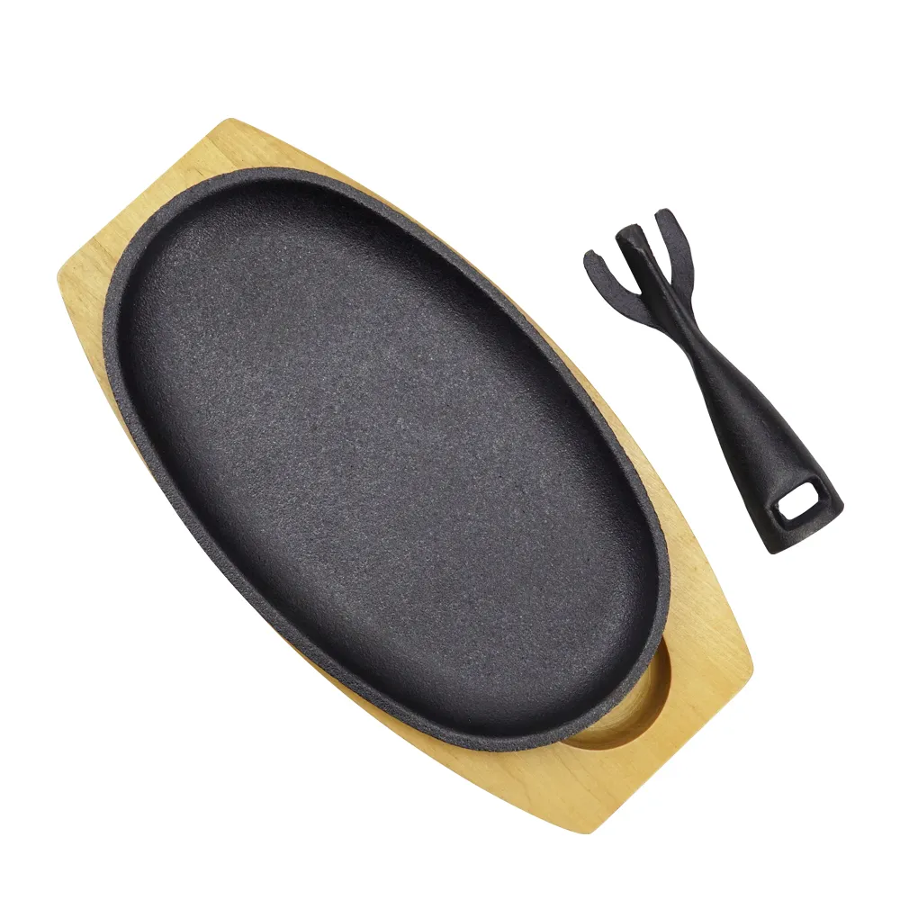 Oval cast iron Fajita frying pan steak plate with wooden base and cast iron handle, suitable for family restaurants, barbecues, weddings, autumn parties