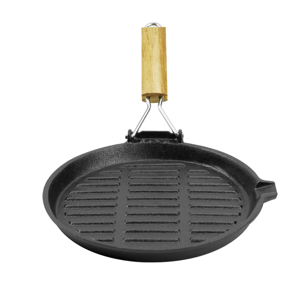 Round cast iron baking tray with folding handle, suitable for meat, fish and vegetables