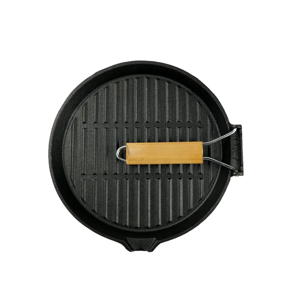 Round cast iron baking tray with folding handle, suitable for meat, fish and vegetables