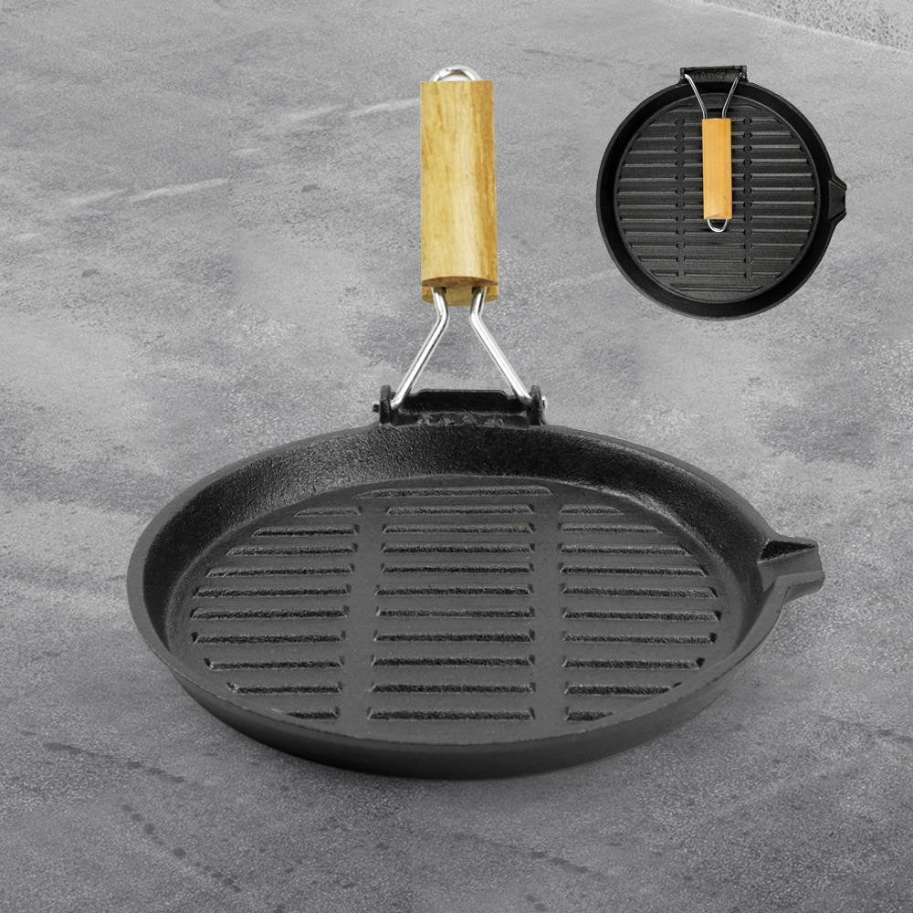 Round cast iron baking tray with folding handle, suitable for meat, fish and vegetables