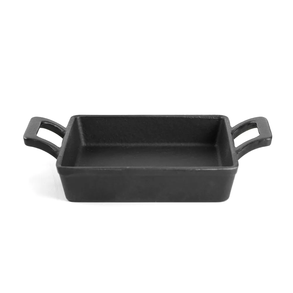Cast iron mini frying pan with double ears, suitable for both indoor and outdoor use.