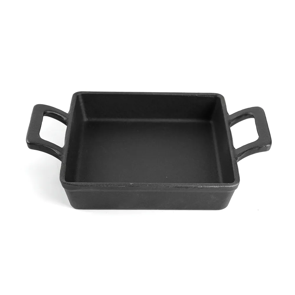 Cast iron mini frying pan with double ears, suitable for both indoor and outdoor use.