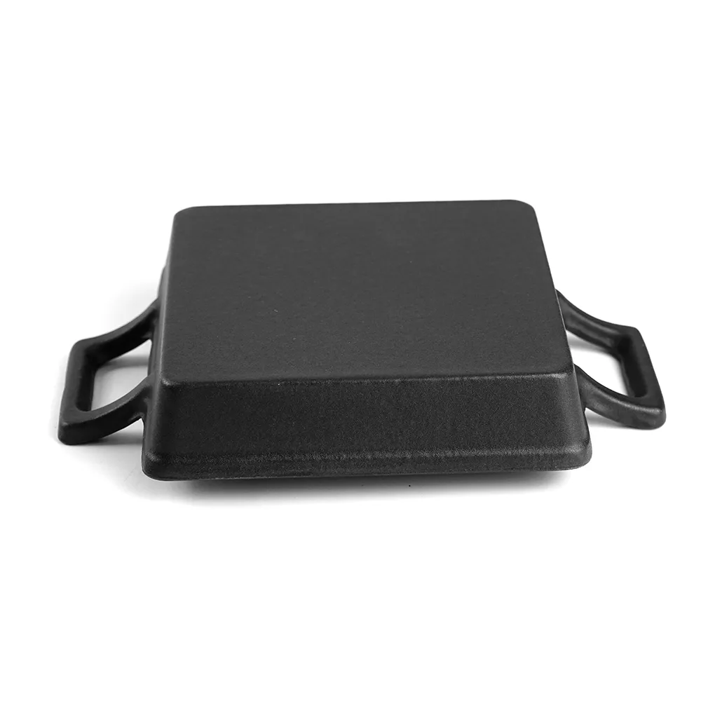 Cast iron mini frying pan with double ears, suitable for both indoor and outdoor use.