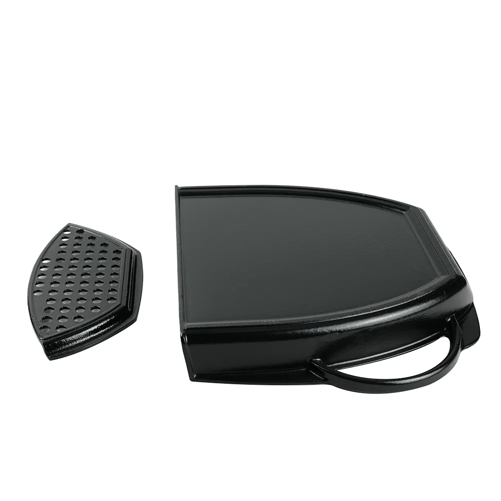 A wide enamel cast iron baking tray