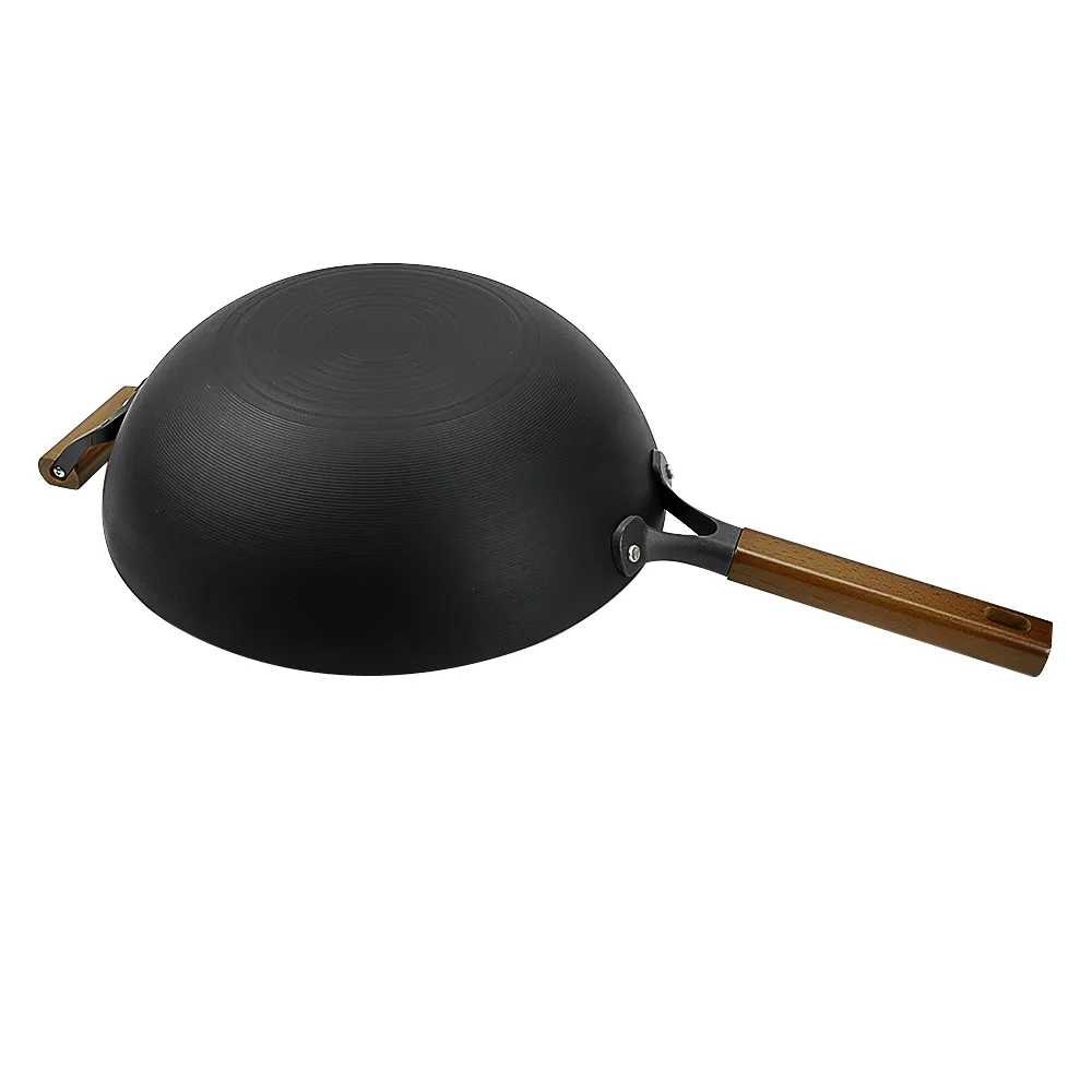 Nitrided cast iron wok with auxiliary handle