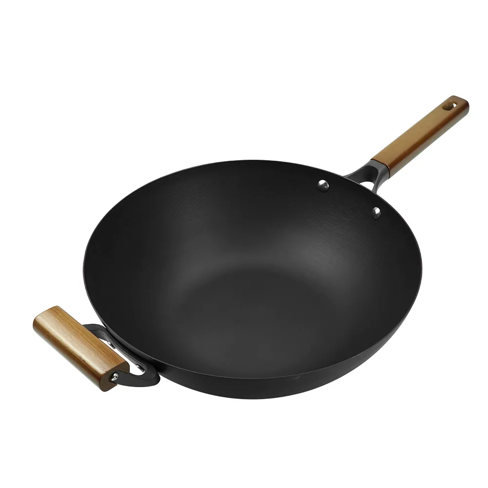 Nitrided cast iron wok with auxiliary handle