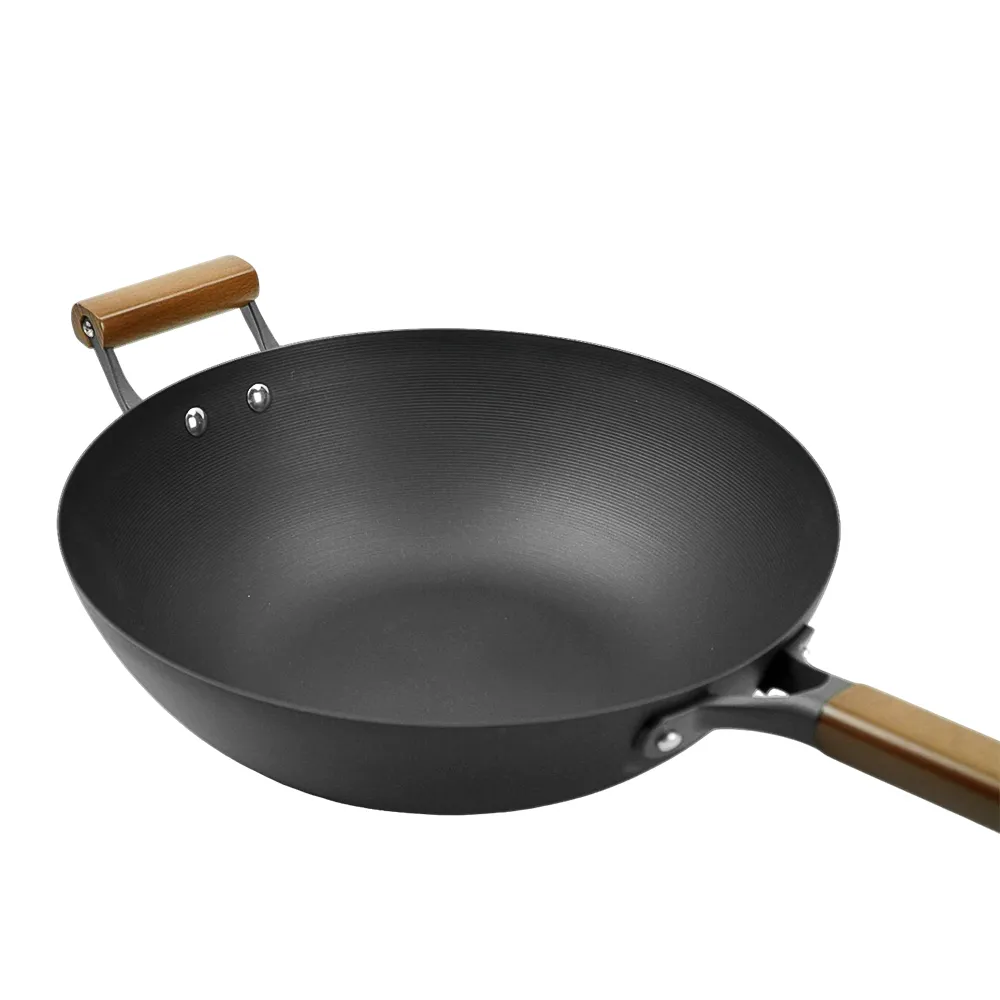 Nitrided cast iron wok with auxiliary handle