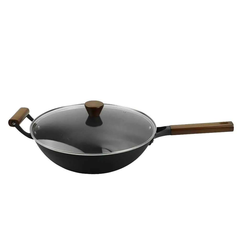 Nitrided cast iron wok with auxiliary handle