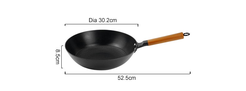 A low-fat, non-stick cast iron wooden-handled wok